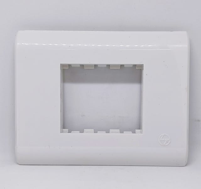 L&T Oris 3Module Regular Cover Plate with Grid Frame